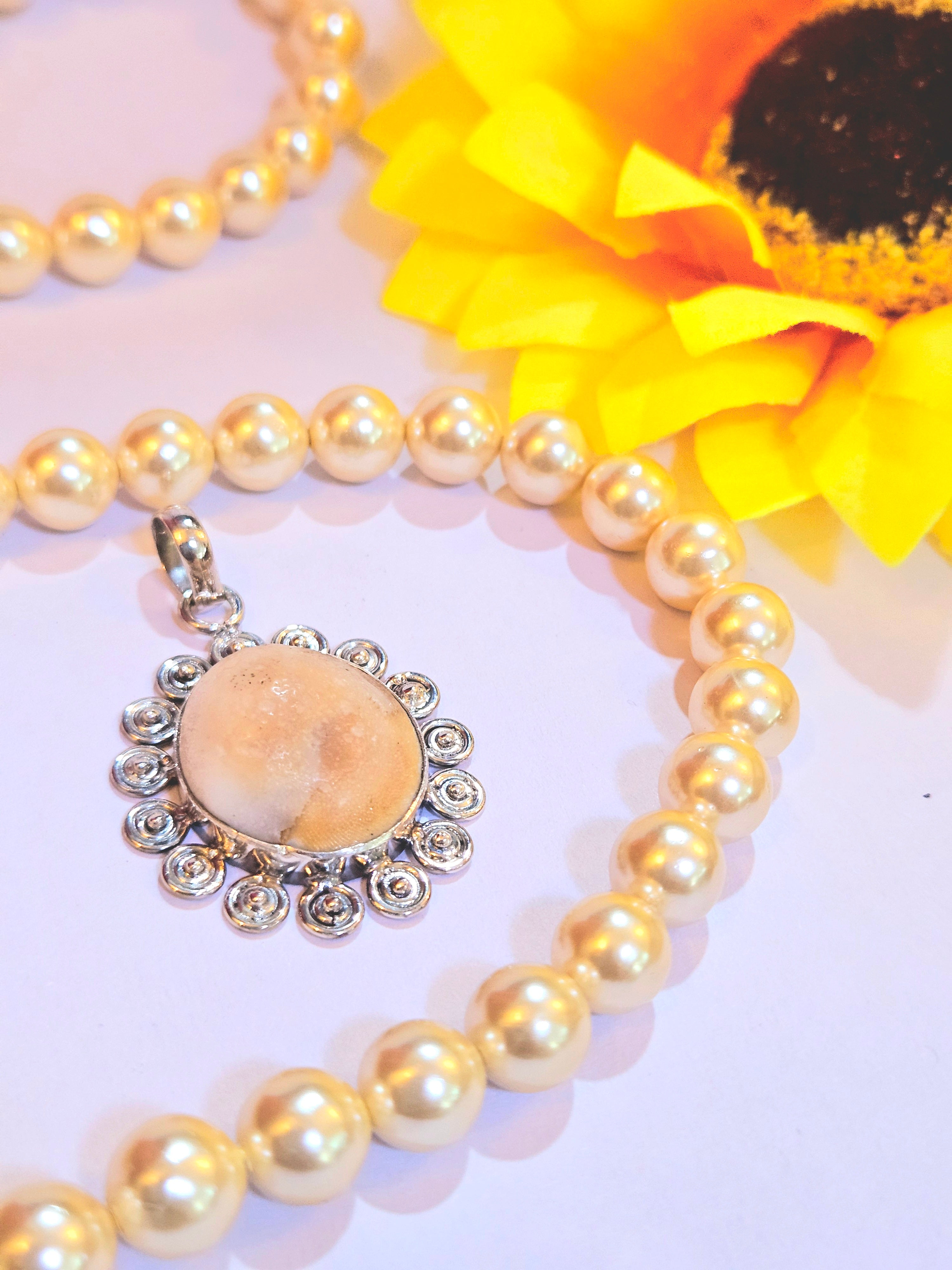 Gomti Chakra Silver Pendant