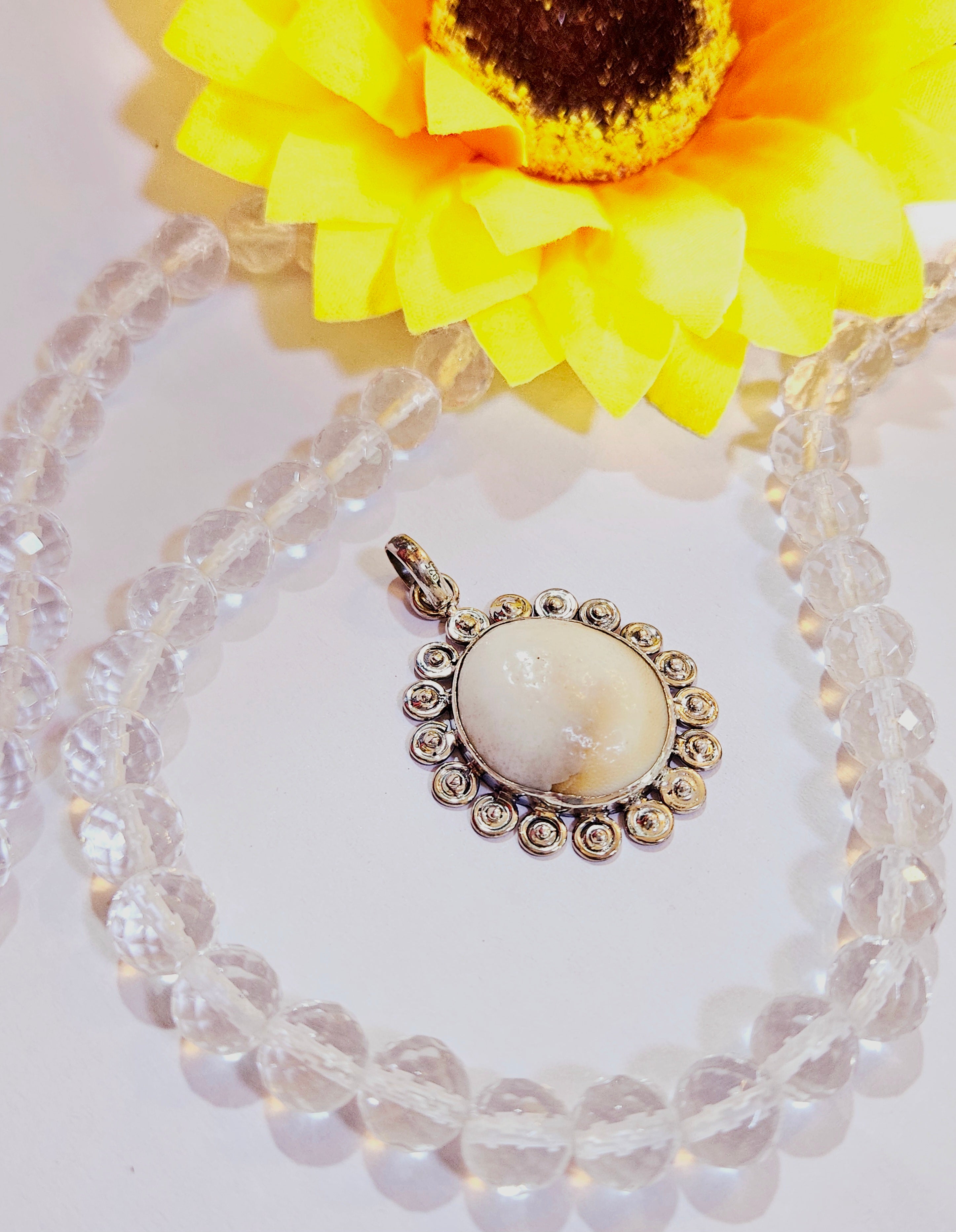 Gomti Chakra Silver Pendant