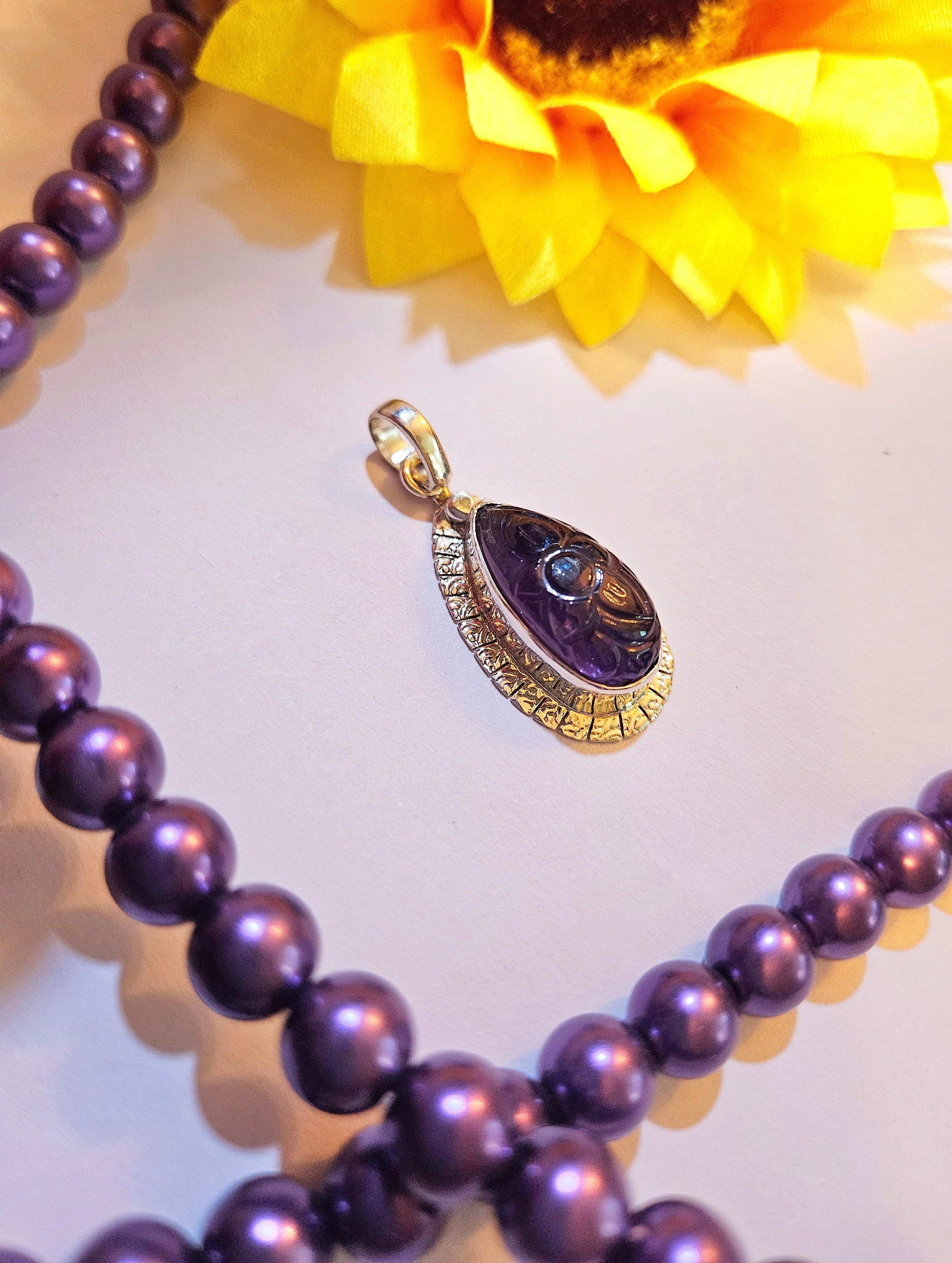 Carved Amethyst Drop Pendant