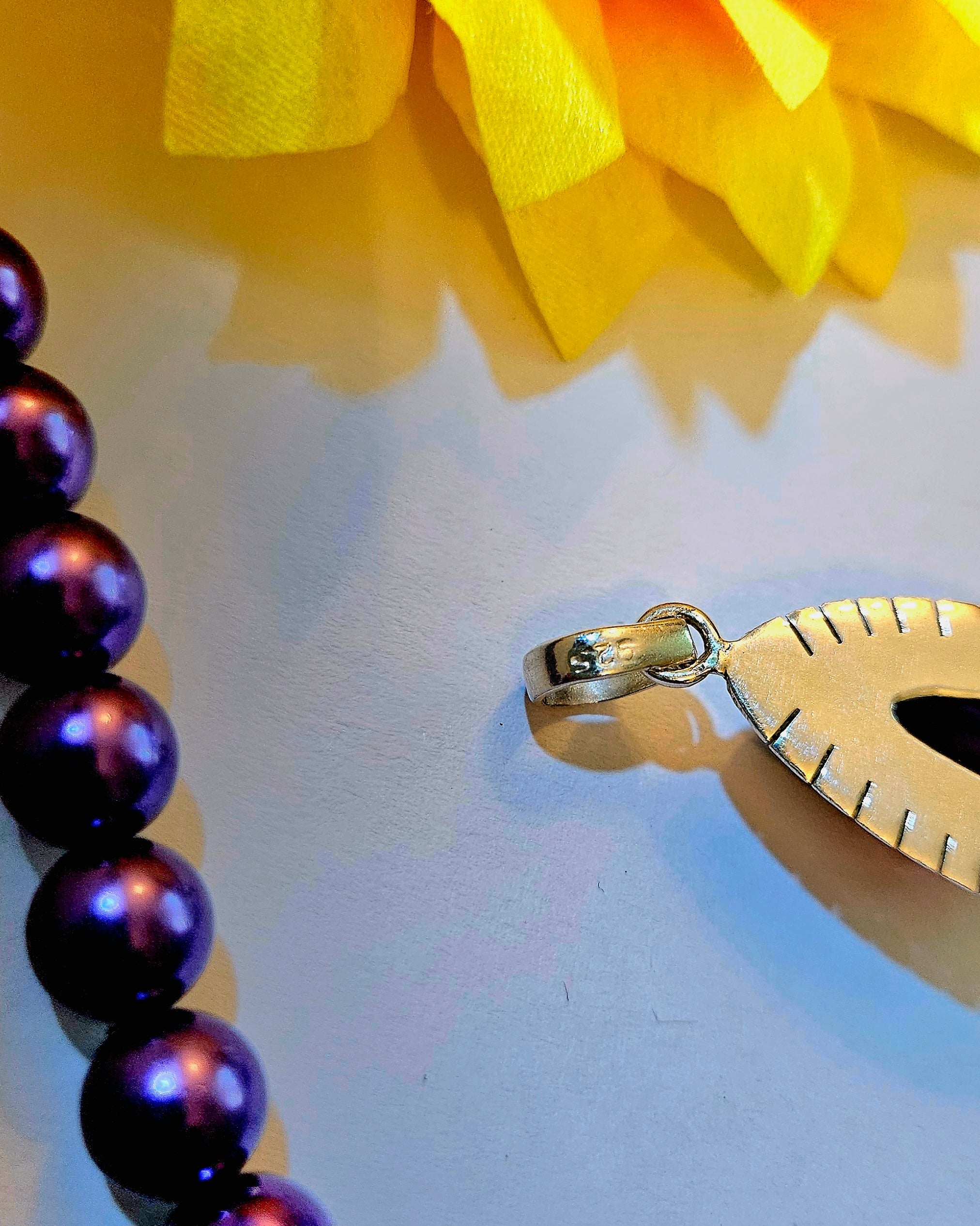 Carved Amethyst Drop Pendant