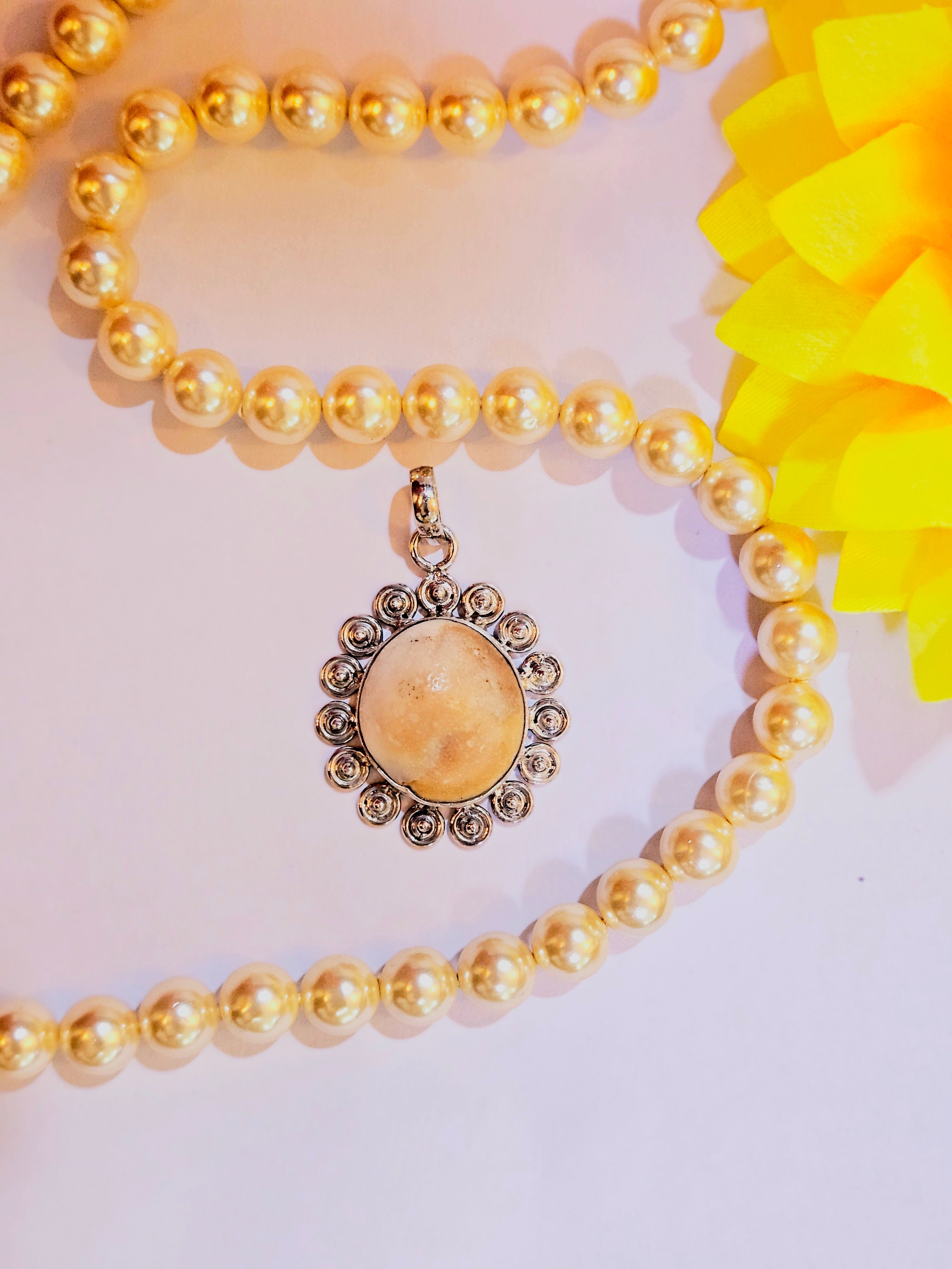 Gomti Chakra Silver Pendant