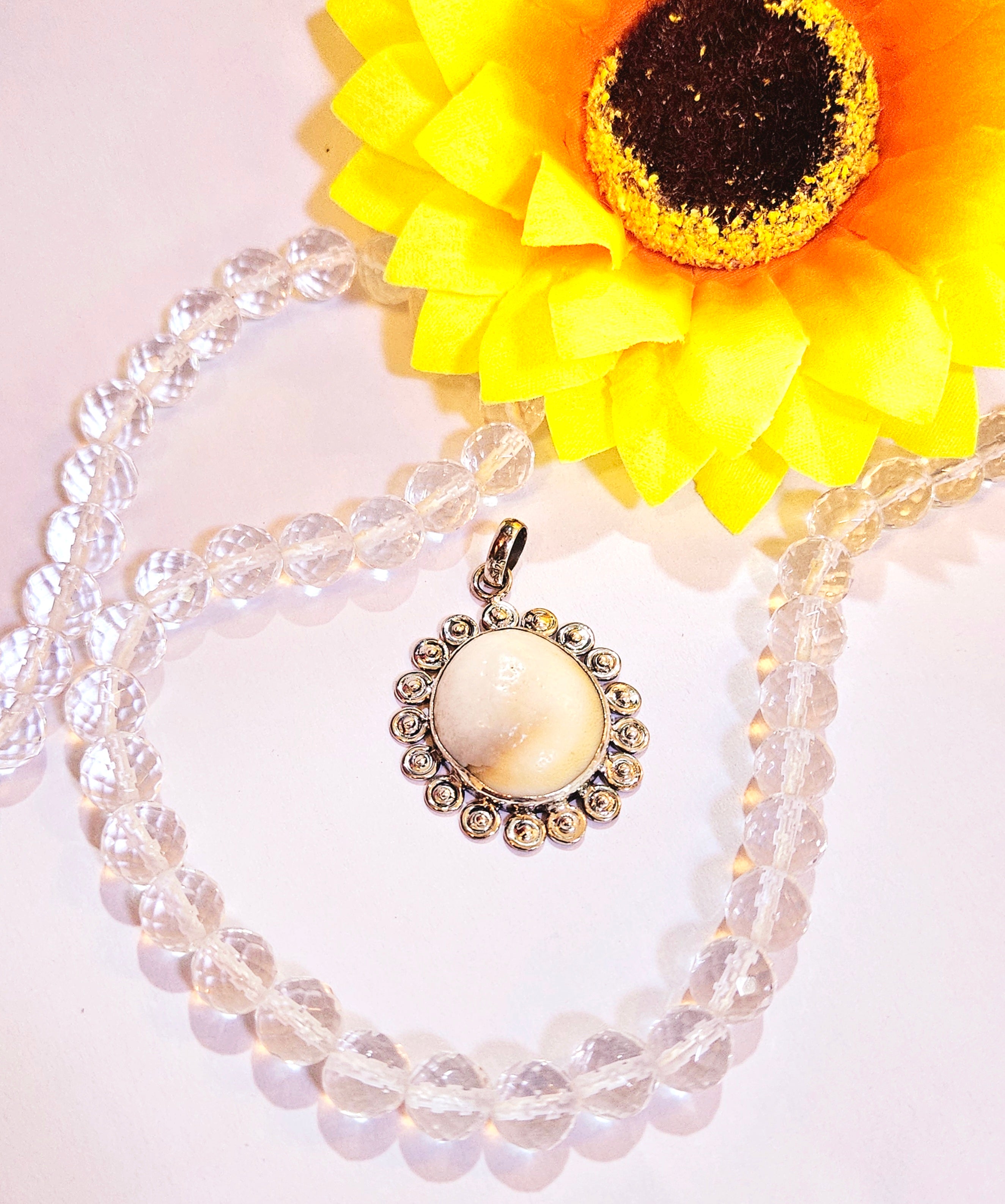 Gomti Chakra Silver Pendant